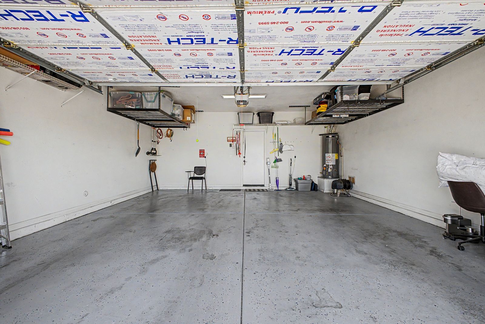 Two-car garage with overhead storage racks
